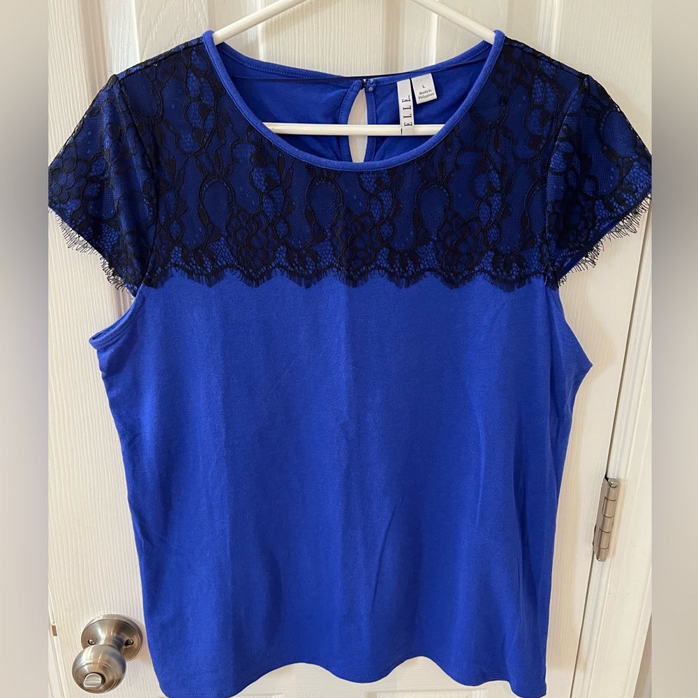 Elle brand short sleeve top, size L.  Medium blue with black lace detail.